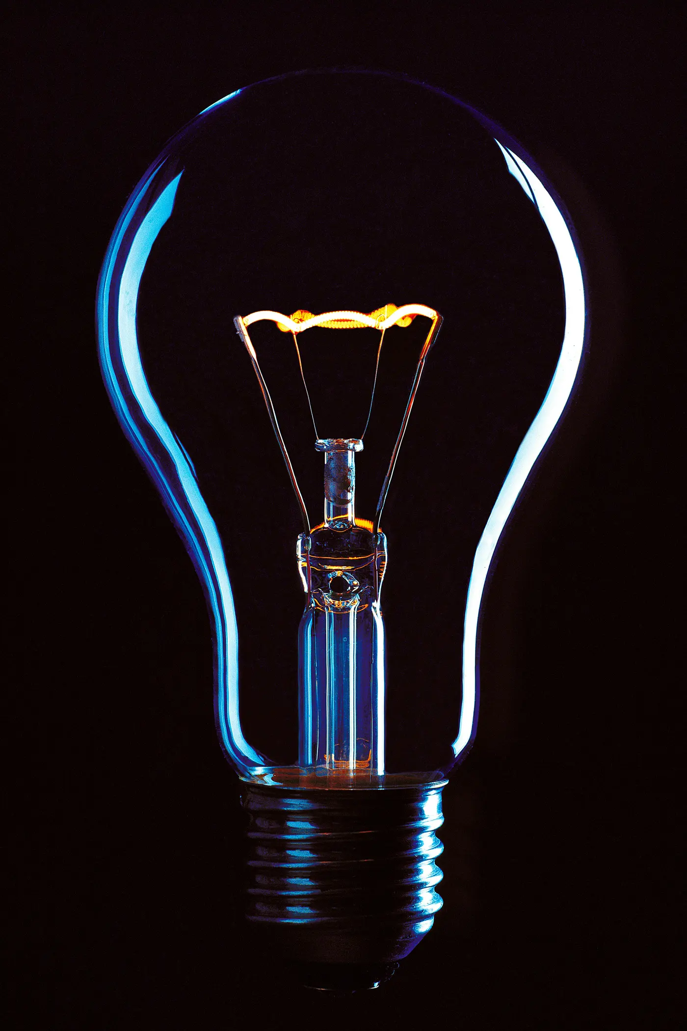 Close-up of a glowing light bulb filament