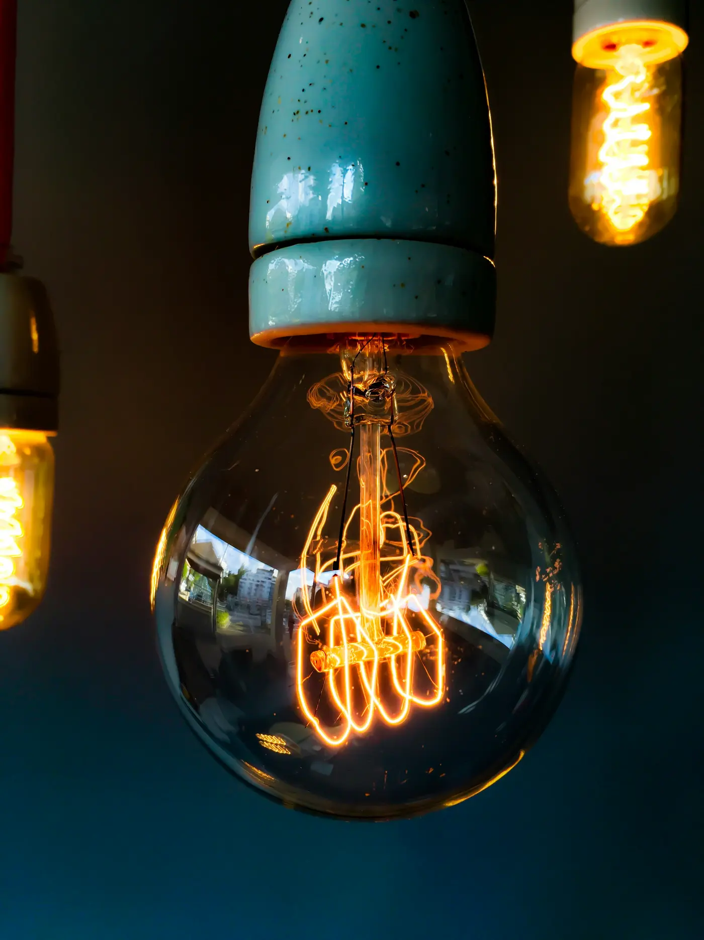 Vintage incandescent light bulb with a glowing filament